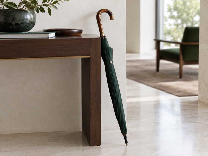 A solid-stick umbrella with a cane handle