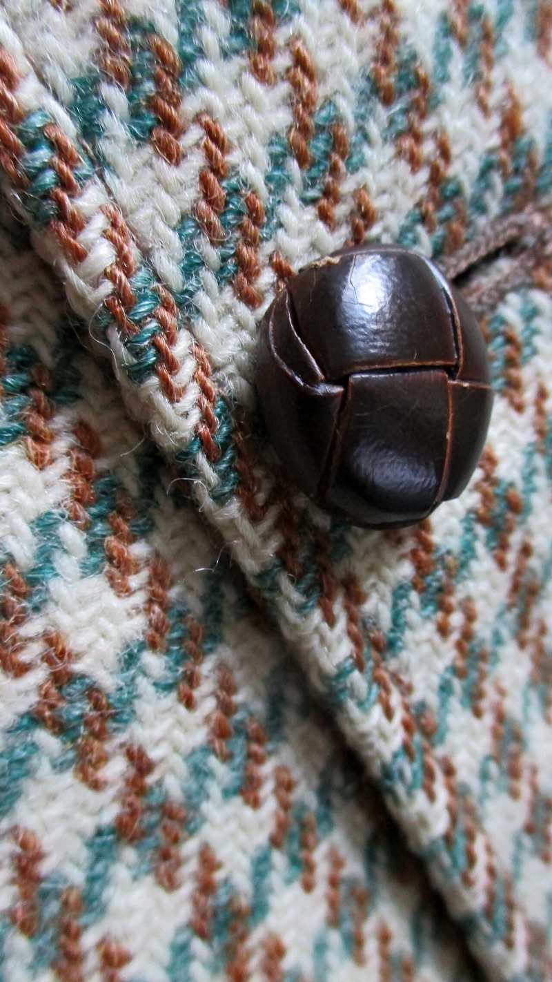 A Harris Tweed weaver at a treadle loom
