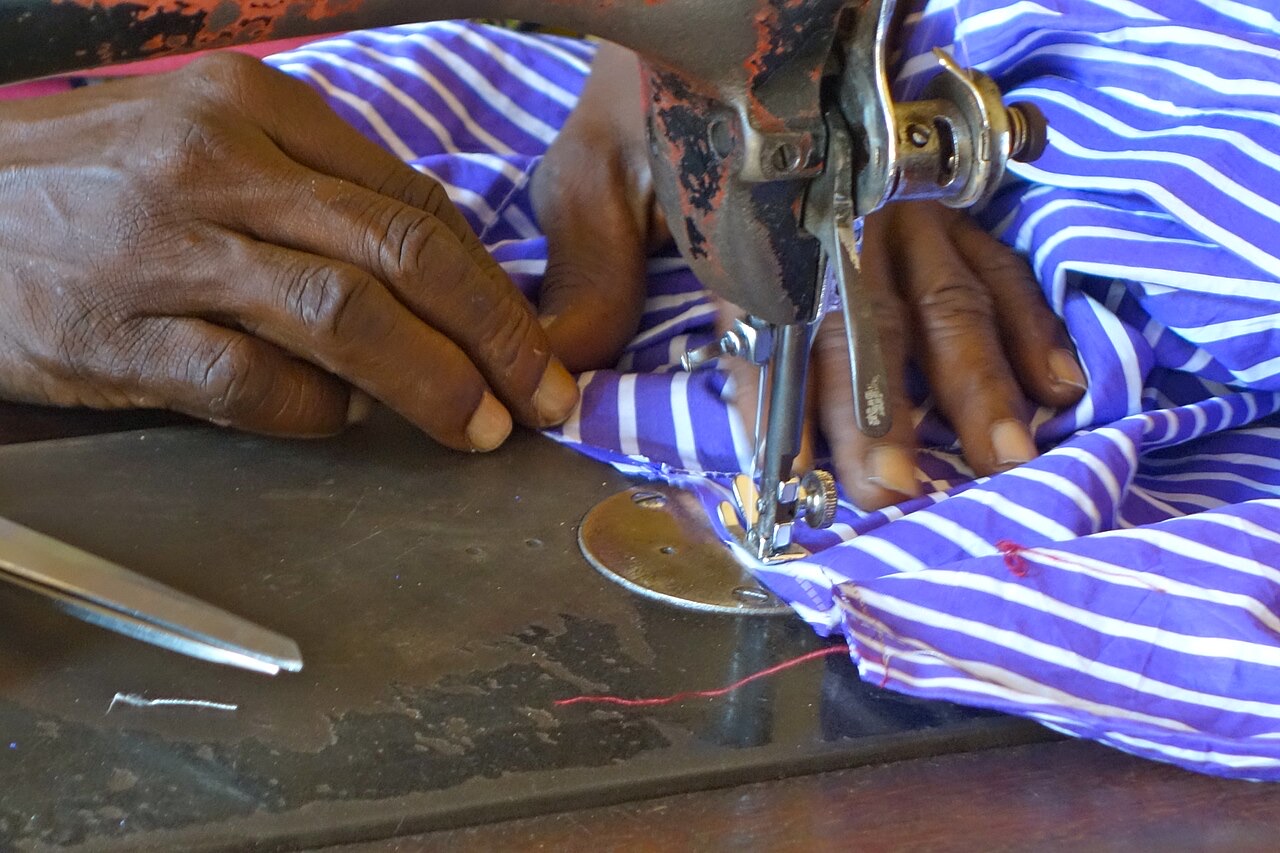Hand sewing in a tailoring workshop